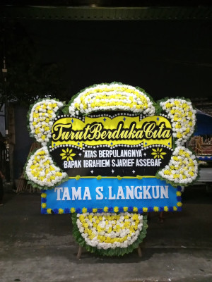 Papan Bunga Duka di Bika