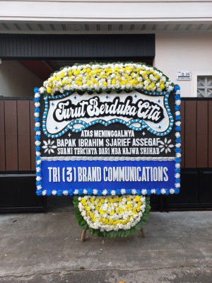 Papan Bunga Duka di Bika